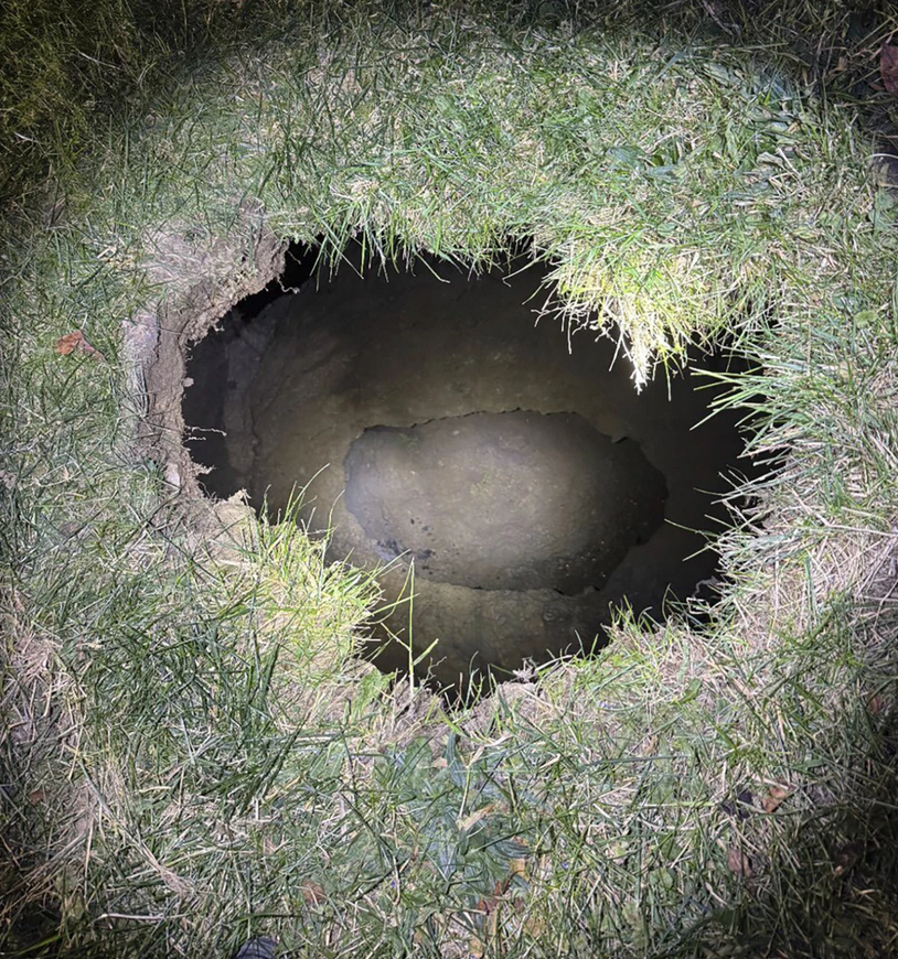 Grandmother falls into sinkhole